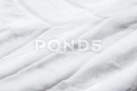 Luxury white fur coat texture background, artificial fabric detail Stock Photos