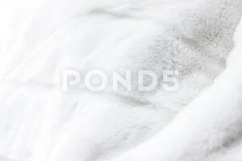 Luxury white fur coat texture background, artificial fabric detail Stock Photos