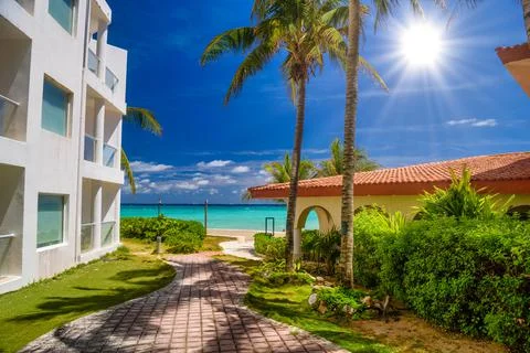 Luxury white villa with palms in Playa del Carmen, Yukatan, Mexico Stock Photos
