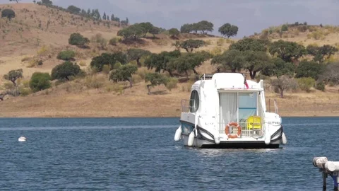 Luxury Yacht cruising in river slow motion Stock Footage
