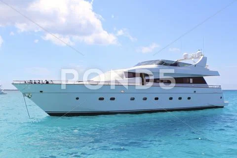 Luxury yacht in turquoise Illetes Formentera Stock Photos