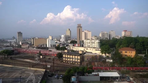 Luz station landscape with red train passing by. Stock Footage 148252386