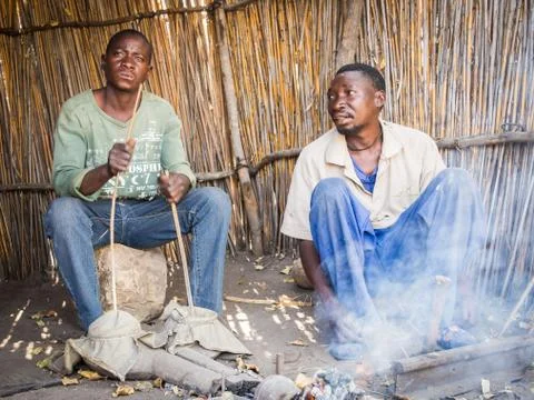 Luzibalule, Namibia - August 13, 2015: Two unidentified African men operating Foto stock