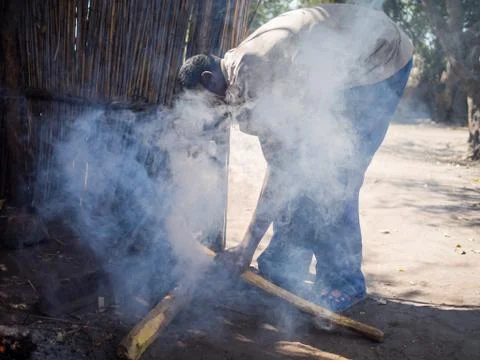 Luzibalule, Namibia - August 13, 2015: Unidentified African man operating Stock Photos