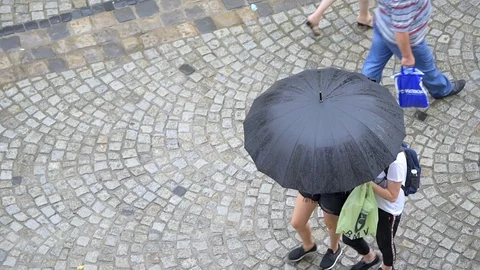Lviv, Ukraine high angle view of old town, people walking umbrella Stock Footage 97683488