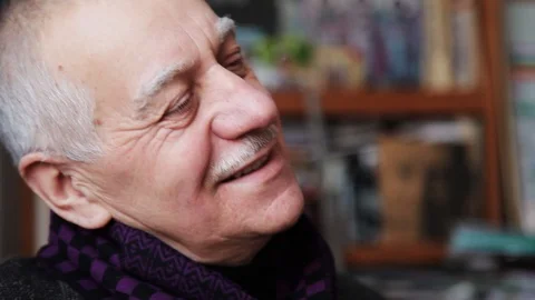 Lviv \ Ukraine - July 7 2018: Happy face old artist man talk with young boy on Stock Footage 99796853