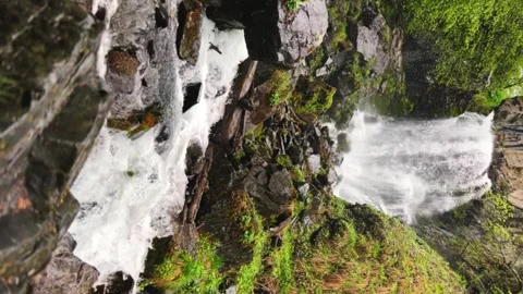Lyazhginsky waterfall in the spring forest.  Stock Footage 254351802