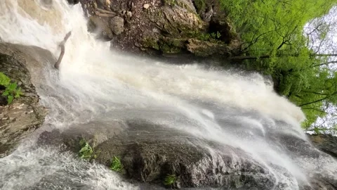 Lyazhginsky waterfall in the spring forest.  Stock Footage 263791065