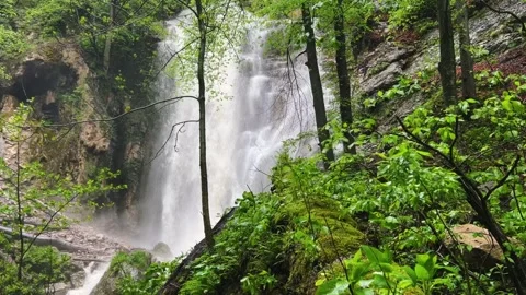 Lyazhginsky waterfall in the spring forest.  Stock Footage 264474361