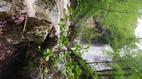 Lyazhginsky waterfall in the spring forest.  Stock Footage 264474529