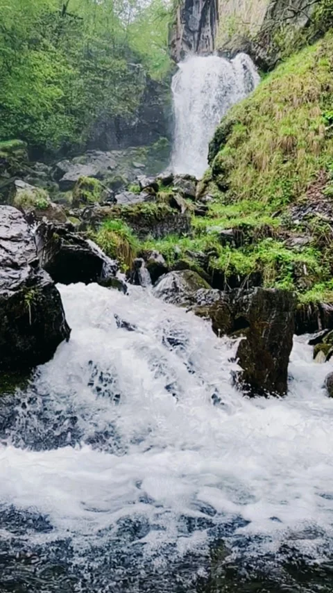 Lyazhginsky waterfall in the spring forest.  Stock Footage 273366332