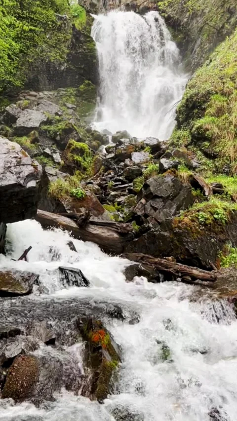 Lyazhginsky waterfall in the spring forest.  Stock Footage 273368769
