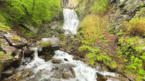 Lyazhginsky waterfall in the spring forest.  Stock Footage 273374101