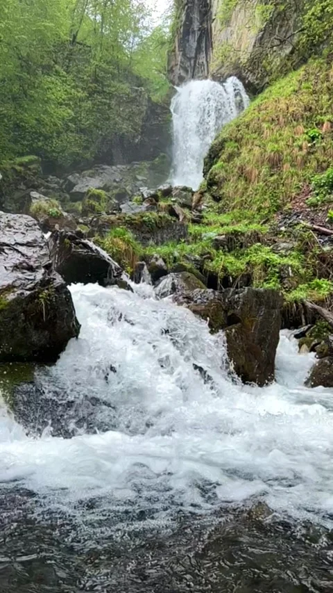 Lyazhginsky waterfall in the spring forest.  Stock Footage 274265495