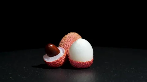 Lychee Exotic Fruit Rotating Background. Harvested Litchi Fruits or Berries.. Stock Footage 303090528