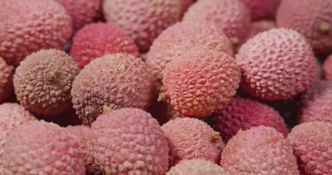 Lychee Exotic Fruit Rotating Background. Harvested Litchi Fruits or Berries.. Stock Footage 307619582