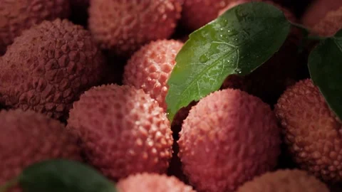 Lychee fruit. Close-up camera moving down and shows lot of fresh lychee fruit Видео 207951540