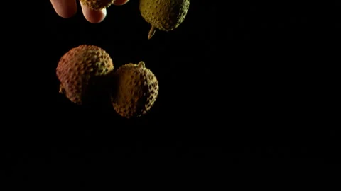 Lychee fruits falling slow motion HD Stock Footage 253058392