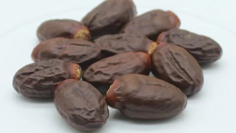 Lychee seeds on white background Stock Footage 141259449
