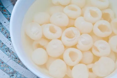 The lychee in the syrup Stock Photos