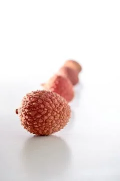 Lychee on a white background Stock Photos