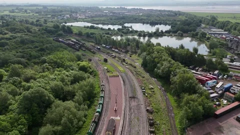 Lydney junction platform, railway siding and River Severn Stock Footage 294922322