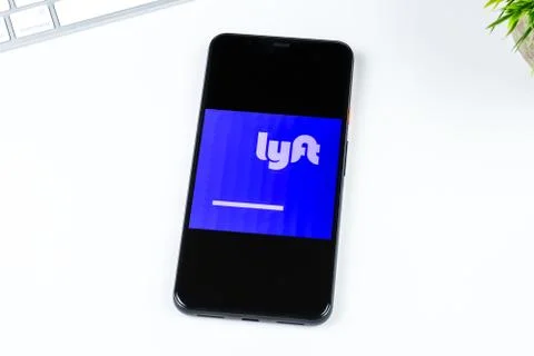 Lyft Direct, powered by Payfare app logo on a smartphone screen Stock Photos