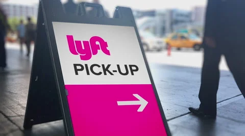 Lyft Ride Sharing Pickup Location Directional Sign Stock Footage 64558675