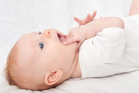 Lying baby Stock Photos