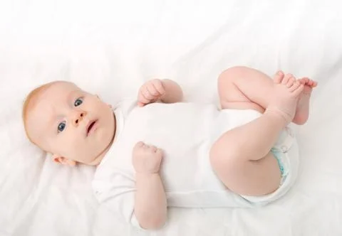Lying baby Stock Photos
