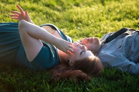 Lying couple Stock Photos