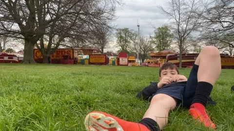 Lying down in the park Stock Footage 183826315