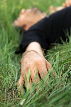 Lying on the grass Stock Photos