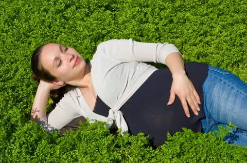 Lying in grass Foto stock