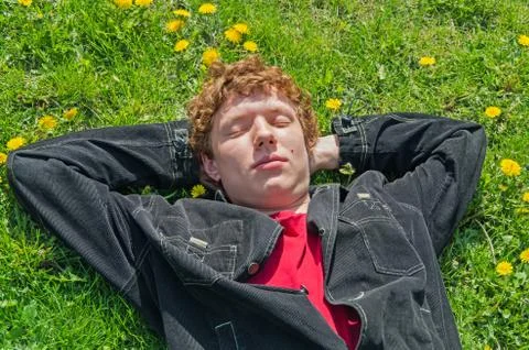 Lying on grass Stock Photos
