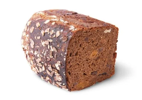 Lying half unleavened black bread with seeds and dried fruit Stock Photos