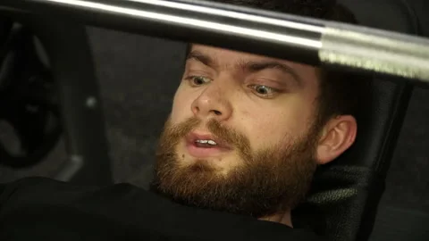 Lying man do exercise with barbell Stock Footage 92996009