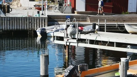 Lying on pier Stock Footage 91373685
