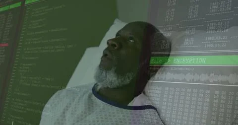 Lying senior patient wearing patterned gown on hospital bed, with digital Stock Photos