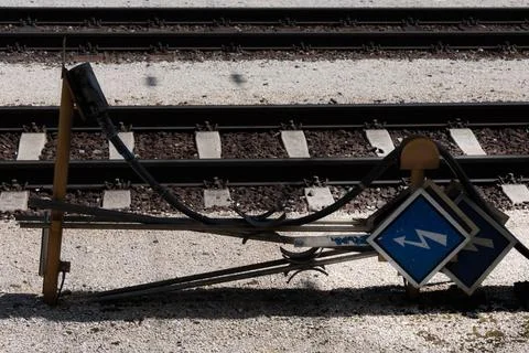 Lying signs electric current lightning bolt railroad Close up of several m... Stock Photos