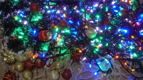 Lying twisted glowing garlands in 4K Video stock 142471302