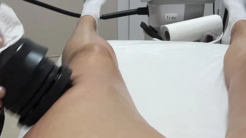 Lymphatic drainage massage on the device in salon	 Vídeos de archivo 334662776