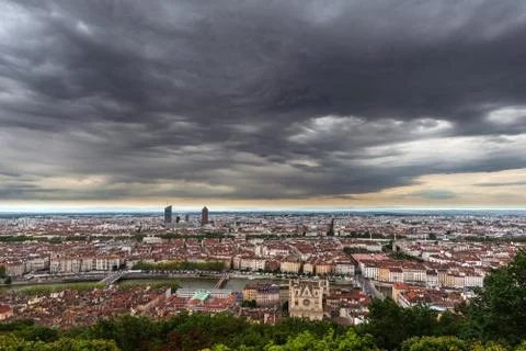 Lyon under menacing gray clouds Stock Photos