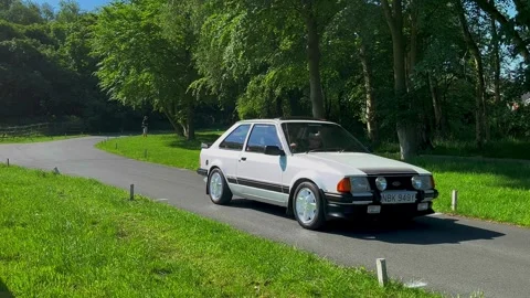 Lytham 19 May 2024: 1983 White Ford Escort RS 1600 i Stock Footage 276316281