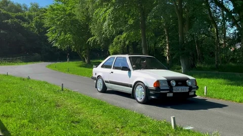 Lytham Hall 19 May 2024; 1983 White Ford Escort 1600 I vintage car Stock Footage 276314131