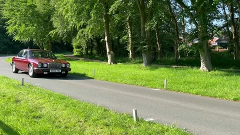 Lytham Hall, UK 19 May 2024.  1984 classic Jaguar XJ12 HE Auto Stock Footage 276219698