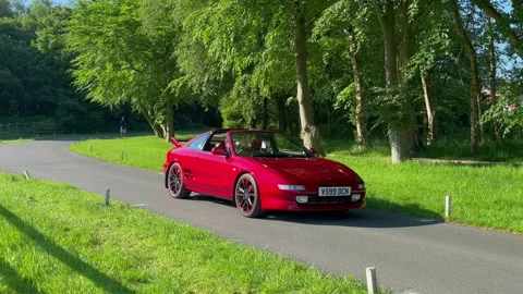 Lytham UK. 19 May 2024: 1999 Red TOYOTA MR2 1998 cc sports car Stock Footage 276153583