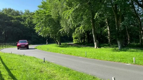 Lytham UK 19 May 2024; Vintage British 1960s_2023 Chinese BYD Atto 3 EV cars Stock Footage 276479294