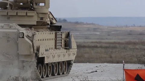 M1 Abrams battle tank advancing at speed through Fort Hood, Texas Stock-Footage 102494837