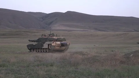 M1 Abrams tank exits from berm at range in Georgia during Agile Spirit 動画素材 113676590